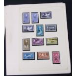 A collection of Falkland Island and Dependencies stamps, loose mounted in Stanley Gibbons pages.