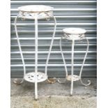A white painted metal plant stand, 76cms (30ins) high; together with a matching smaller (2).