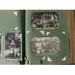 A Postcard Album with approximately 150 early to mid 20th century postcards