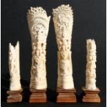 A pair of Indonesian carved bone vases, 24cms (9.5ins) high; together with a smaller similar,
