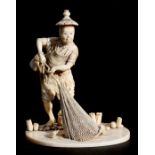A 19th century Japanese carved ivory okimono in the form of a fisherman with his net and creel on