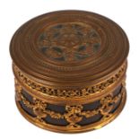 A French gilt metal dressing table box, 11cms (4.75ins) diameter.Condition ReportGood overall