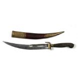 An Islamic type dagger with an engraved blade and brass & leather scabbard, 40cms (15.75ins) long.