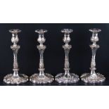 A set of four ornate silver plated candlesticks. 25.5cm (10 ins) highCondition Reportcandlestick 1 -