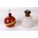 A 19th century French opaline glass perfume bottle, the hinged lid inset with an image of a