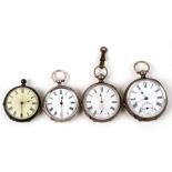 A group of four silver cased open faced pocket watches.