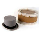 A Lincoln Bennett & Co. Hatters grey silk top hat, cased.