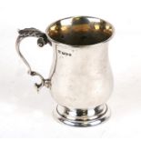 A silver christening tankard, Chester 1914, weight 127g.Condition ReportThere is no engraving on the