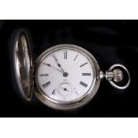 A large engraved coin silver full hunter pocket watch, the movement by Illinois Watch Co. 5.5cm (