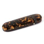 A Georgian tortoiseshell spectacle case, 13cms (5ins) long.Condition ReportDamage and repair to