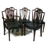 A set of five 19th century mahogany dining chairs with pierced vase shaped splats, serpentine