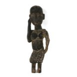 A Polynesian / tribal figure of a woman, 43cms (17ins) high.