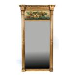 A George III style gilt gesso pier mirror, the frieze decorated with a still life scene, 69cms (