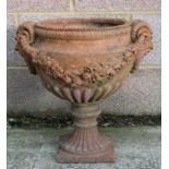 A terracotta urn of classical form, approximately 46cms (18ins) diameter.Condition ReportGood