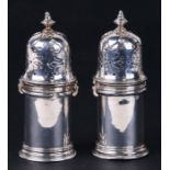 A pair of heavy gauge Victorian silver pepper casters, London 1891 and makers mark 'A.S'. 9cm (3.5
