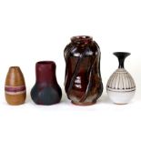 A group of Studio Pottery vases to include examples by Dennis Moore, the largest 19cms (7.75ins)