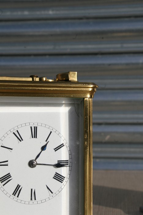A brass cased repeater carriage clock, the white enamel dial with Roman numerals, the movement - Image 4 of 7