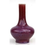 A Chinese flambé vase with four character mark to the underside, 18cms (7ins) high. Condition