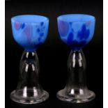 A pair of Orrefors art glass goblets inscribed 'David Taylor, Orrefors 1973' to the base, 13cms (