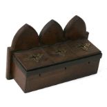 An oak ecclesiastical three-division collection box, 39cms (15ins) wide.