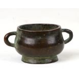 A late 19th century Chinese miniature bronze censer with four character mark to base, 7.7cms (