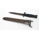 A scabbard for a US Army M1 bayonet, overall length 27cms (10.625ins) together with a US Army