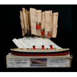 A Chad Valley Cunard-White Star Line RMS Queen Mary 'Take to Pieces' model, complete with original