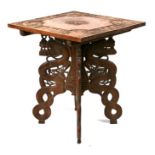 An early 20th century Japanese hardwood folding occasional table, the top carved 'Motor Machine