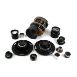 A quantity of camera lenses to include Fijinon-TV-Z 1;18/18-100 lens and other similar lenses.