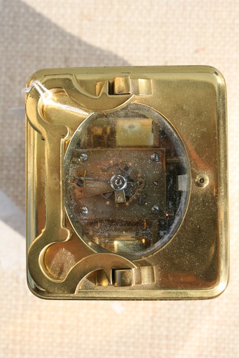 A brass cased repeater carriage clock, the white enamel dial with Roman numerals, the movement - Image 6 of 7