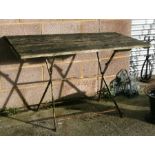 A French wood and wrought iron garden table, 125cms (49ins) wide; together with four matching chairs