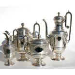 A Victorian four-piece silver tea and coffee set with chased and embossed decoration, London 1876