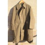 A WW2 British Army great coat in a very good condition, doesn't look as though it has ever been