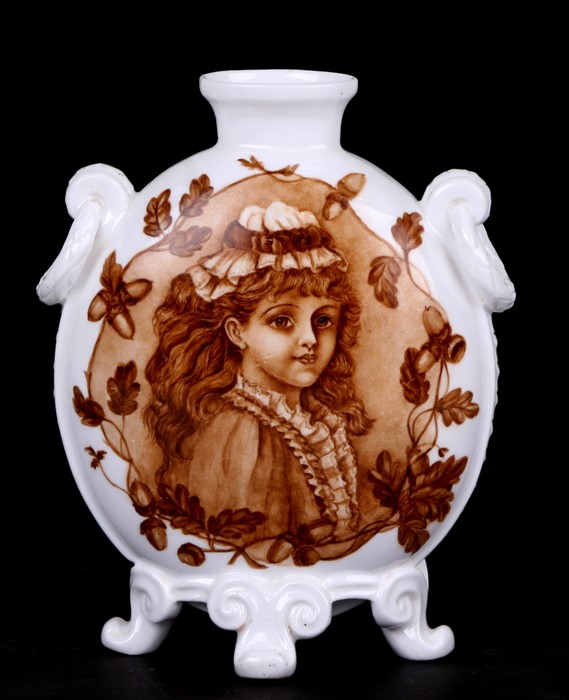 A Derby vase decorated with portrait panels of young girls, 19cms (7.5ins) high.