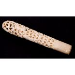 A Burmese carved and pierced ivory handle, 11cms (4.25ins) long.Condition ReportPossibly one or