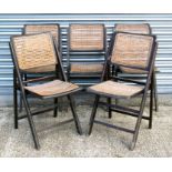 A set of five wooden folding garden chairs with cane backs and seats (5).