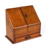 A late 19th century oak desk top stationery box, 32cms (12.5ins) wide.