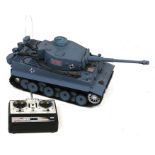 A remote control scale model of a Tiger tank, 40cms (16ins) long, together with a digital microscope