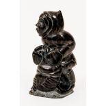 Inuit carved 1980 sculpture Hunter with Seal
