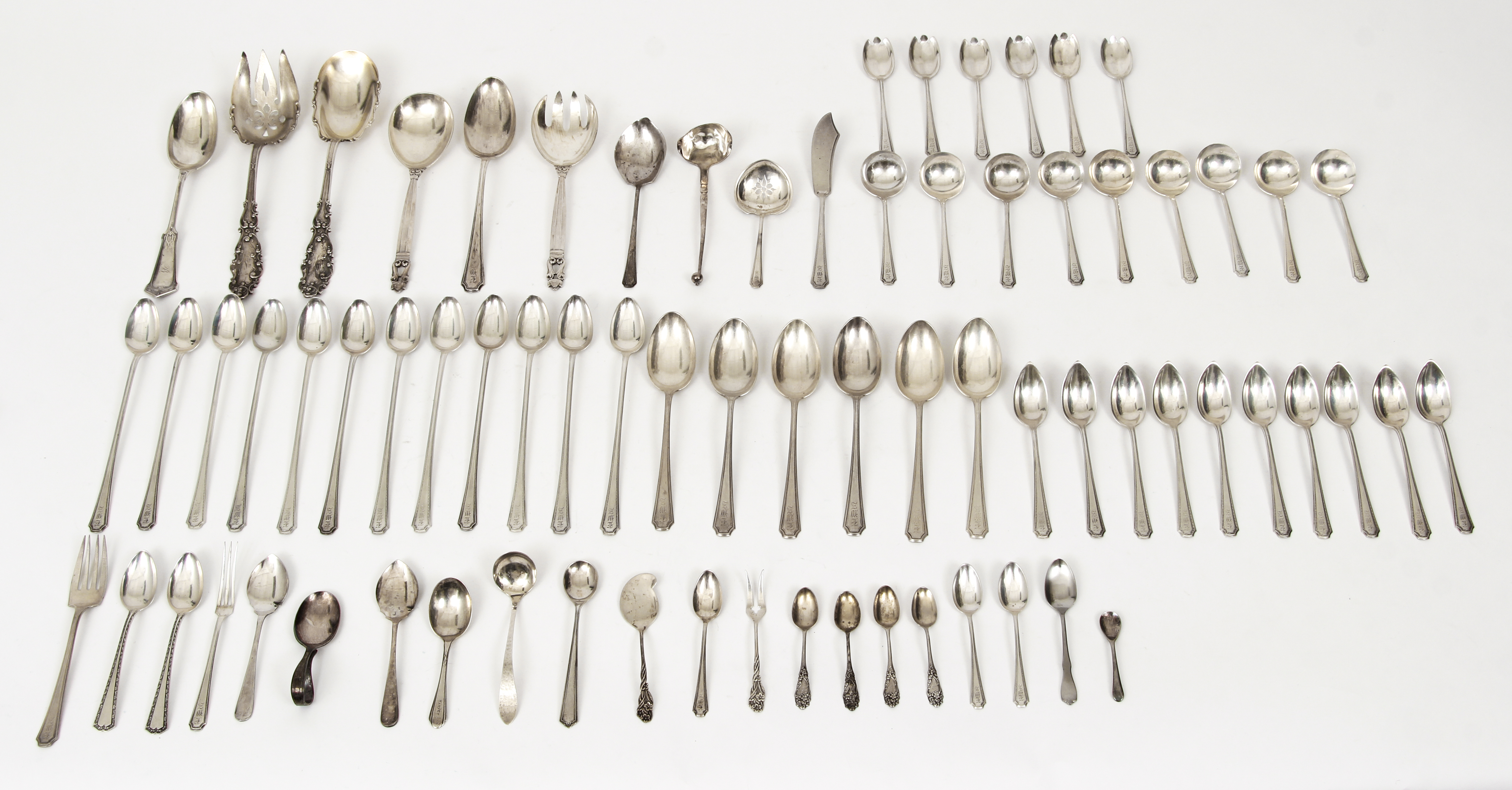 Lot of assorted sterling spoons and serving pieces