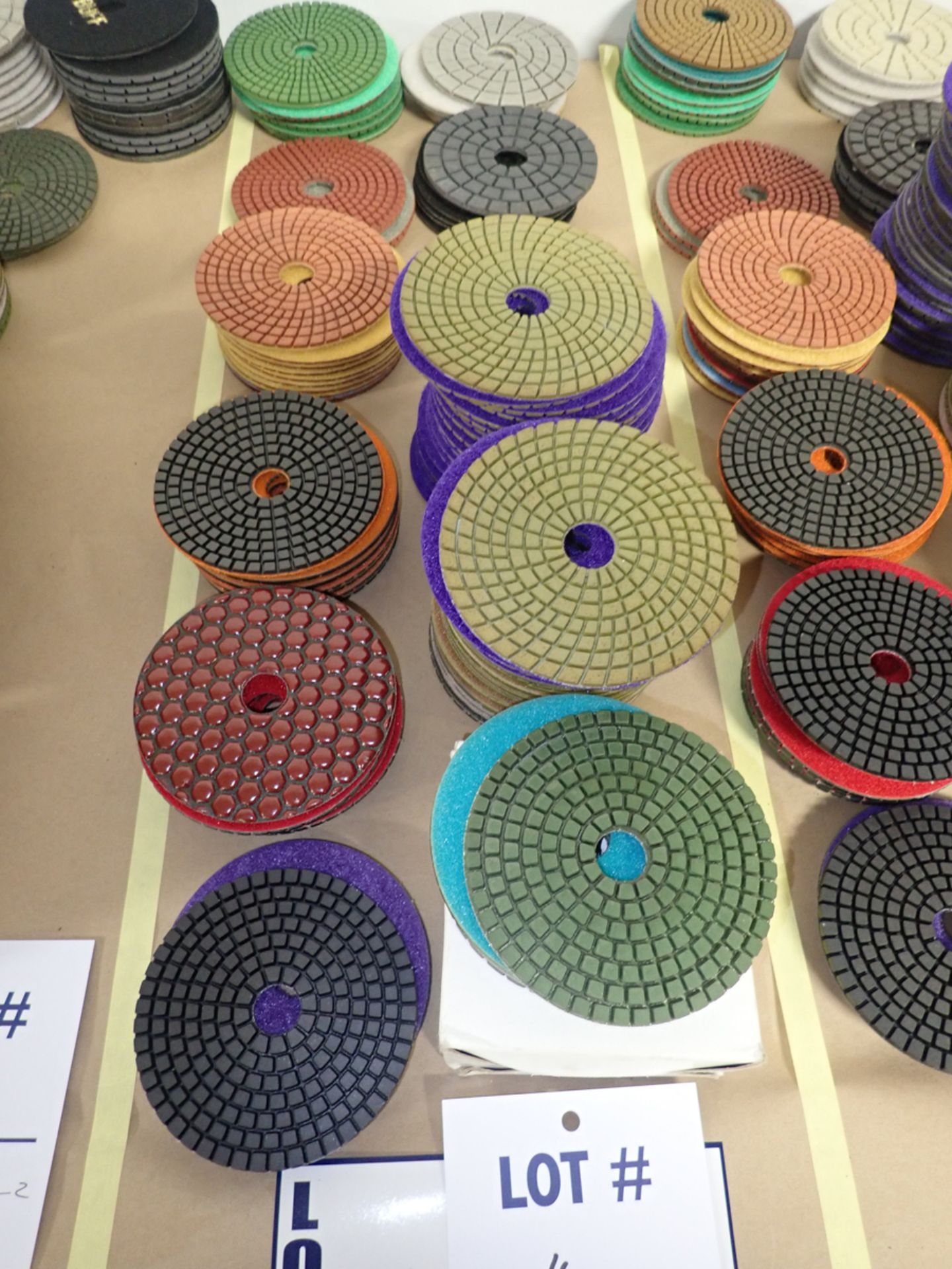LOT OF (105) ASSORTED 4" GRINDING/POLISHING PADS *SEE PICTURES FOR COMPLETE QUANTITY PER GRIT*