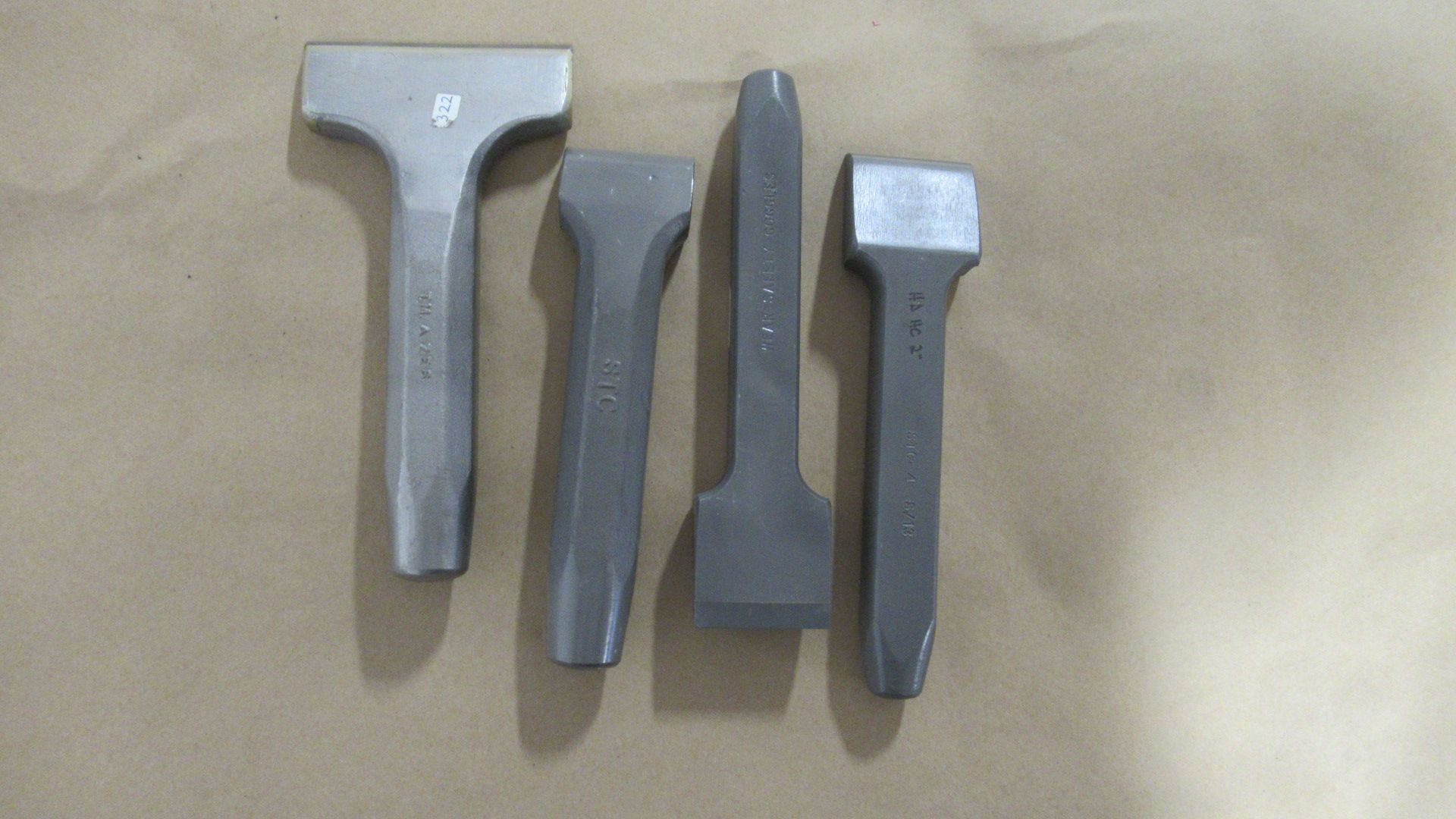 LOT OF (4) CHISELS W/ CARBIDE TIPS
