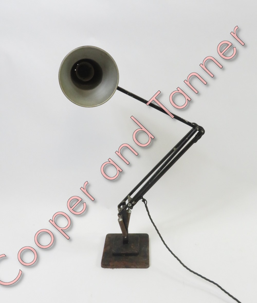 A Herbert Terry and Sons black painted anglepoise style desk lamp