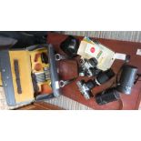 CAMERA CASE INCLUDING AN OLYMPUS OM10 CAMERA, A MINOLTA SLR CAMERA + OTHER EQUIPMENT