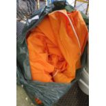 LARGE BAG OF WATERPROOF COATS