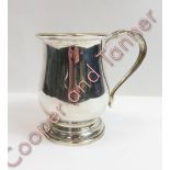 A silver beer mug, by Joseph Gloster Ltd, Birmingham 1931, of plain baluster form, 13.5 cm high, 338