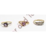 A single stone amethyst ring; a magic topaz ring with a single cut diamond to each shoulder; both