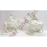 A pair of 19th century Moore Brothers ceramic salt cellars, of a male and female riding a donkey,