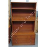 A mid century teak unit with a single adjustable shelf, two short drawers and three long drawers