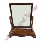 A 19th century mahogany dressing table mirror, with serpentine front